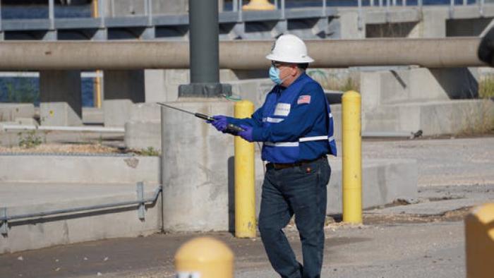 Rick Diaz de leon, HSE Specialist at Pin Oak Terminals, acts as a safety personnel to monitor reaction to the safety plan and document response at a fire simulation on June 17.